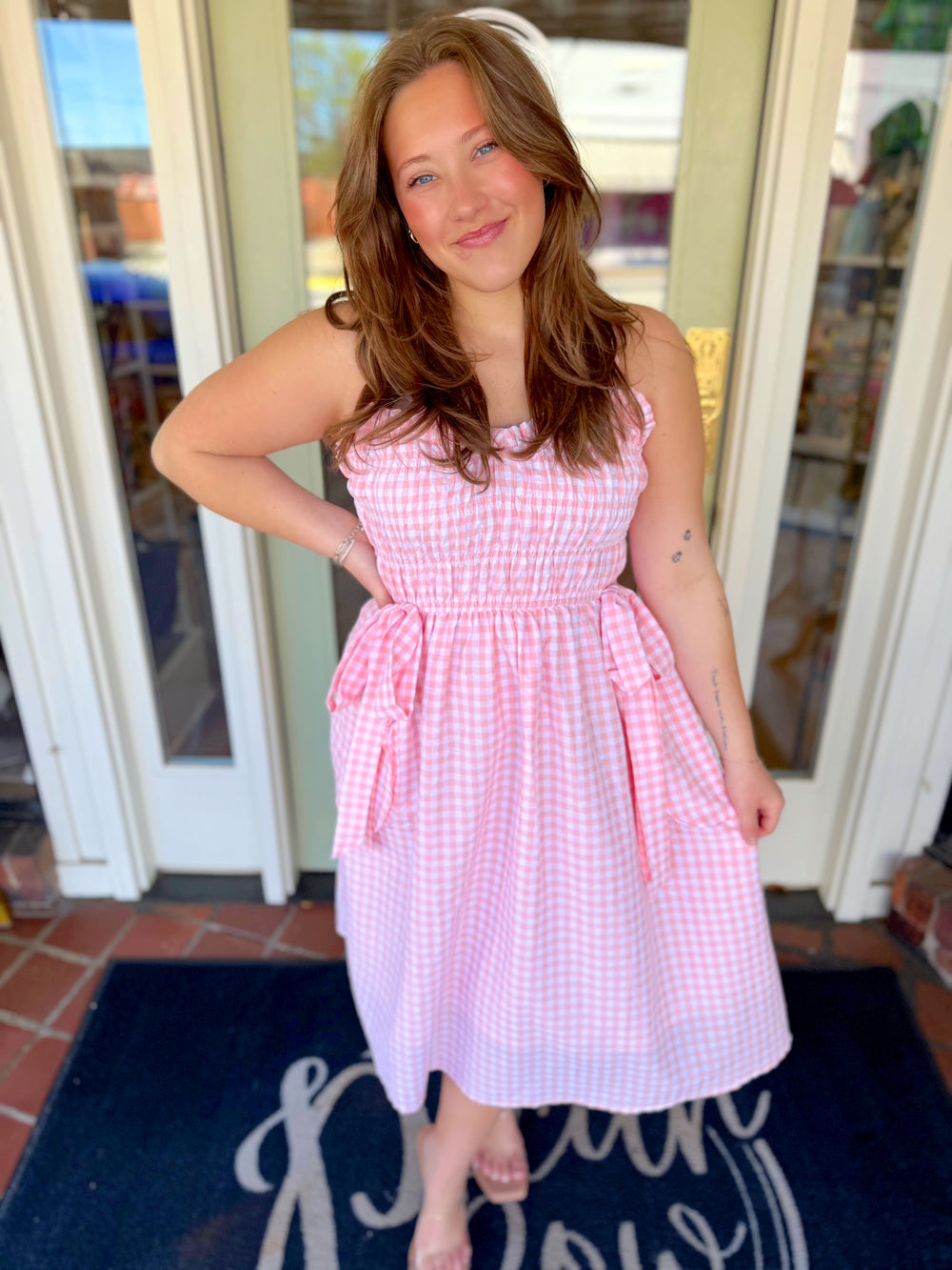 Pink gingham midi dress with bow detailing 
