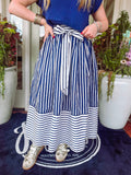 Navy and white striped skirt with a zipper on the side finish with an adjustable tie bow detailing on the front 