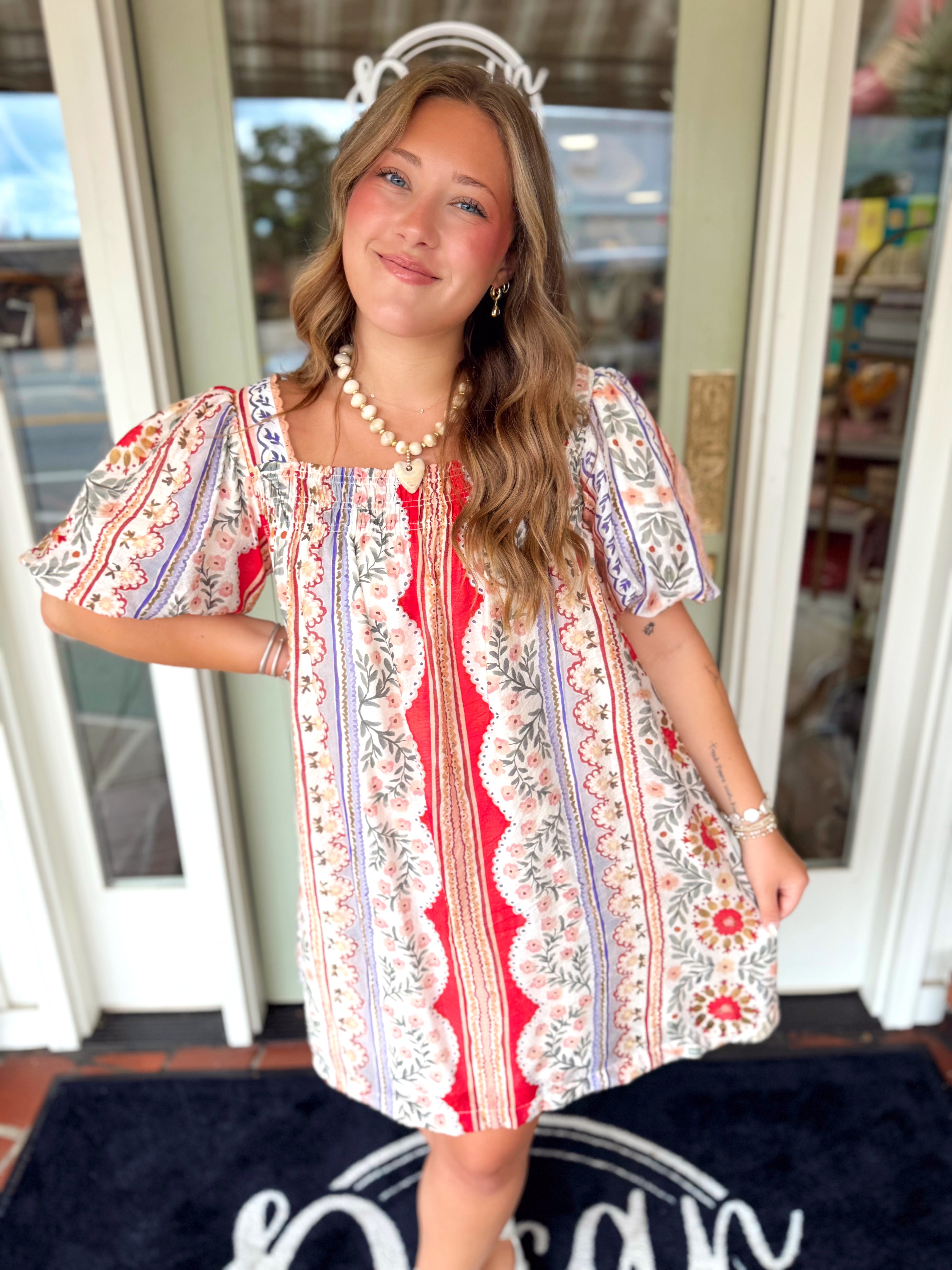 Coloful floral dress with a square neckline 
