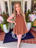 Playful brown dress with white polka dots and a bubble hem