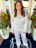 A button down satin pajama set with green and pink florals 