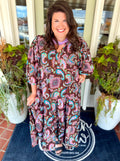 This printed dress features a chocolate brown base covered in a colorful paisley-inspired print, giving it the perfect mix of boho and feminine style.
