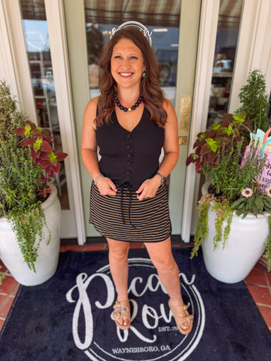 Black and taupe striped skort with an elastic waistband and pockets