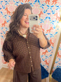  This relaxed top features a collared neckline, button-front closure, and chest patch pocket for a timeless look