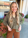 A classic plaid button-down with an easy, oversized fit! 