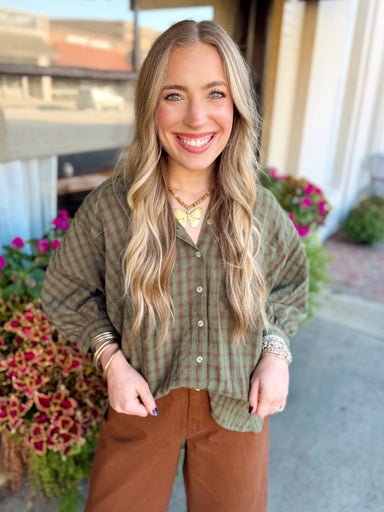 A classic plaid button-down with an easy, oversized fit! 