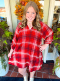 This plaid style features a flattering split V-neckline with a smocked back yoke for added detail and shape.