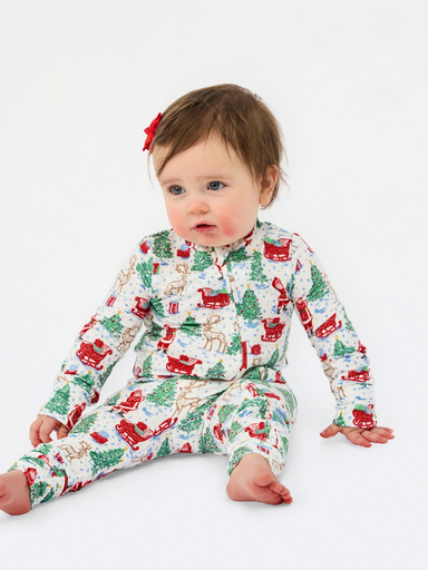 red sleigh, reindeer and santa on baby pjs
