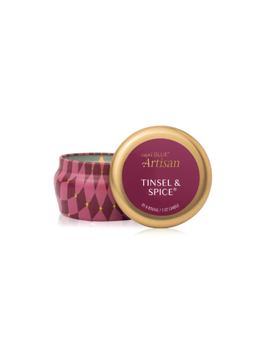plum color tin with scents of pine and spice