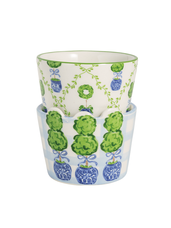Two decorative pots with green and blue patterns on a white background