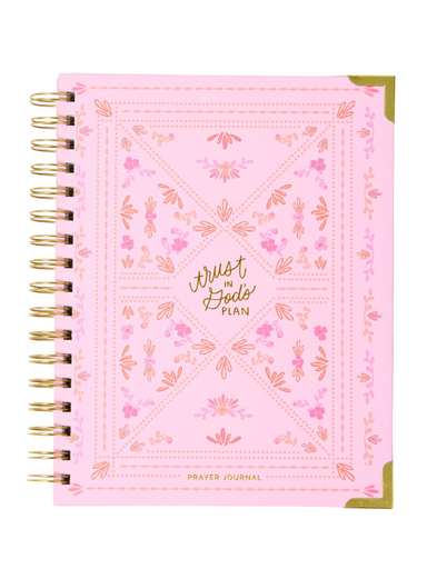 Pink prayer journal with floral patterns and text on a white background