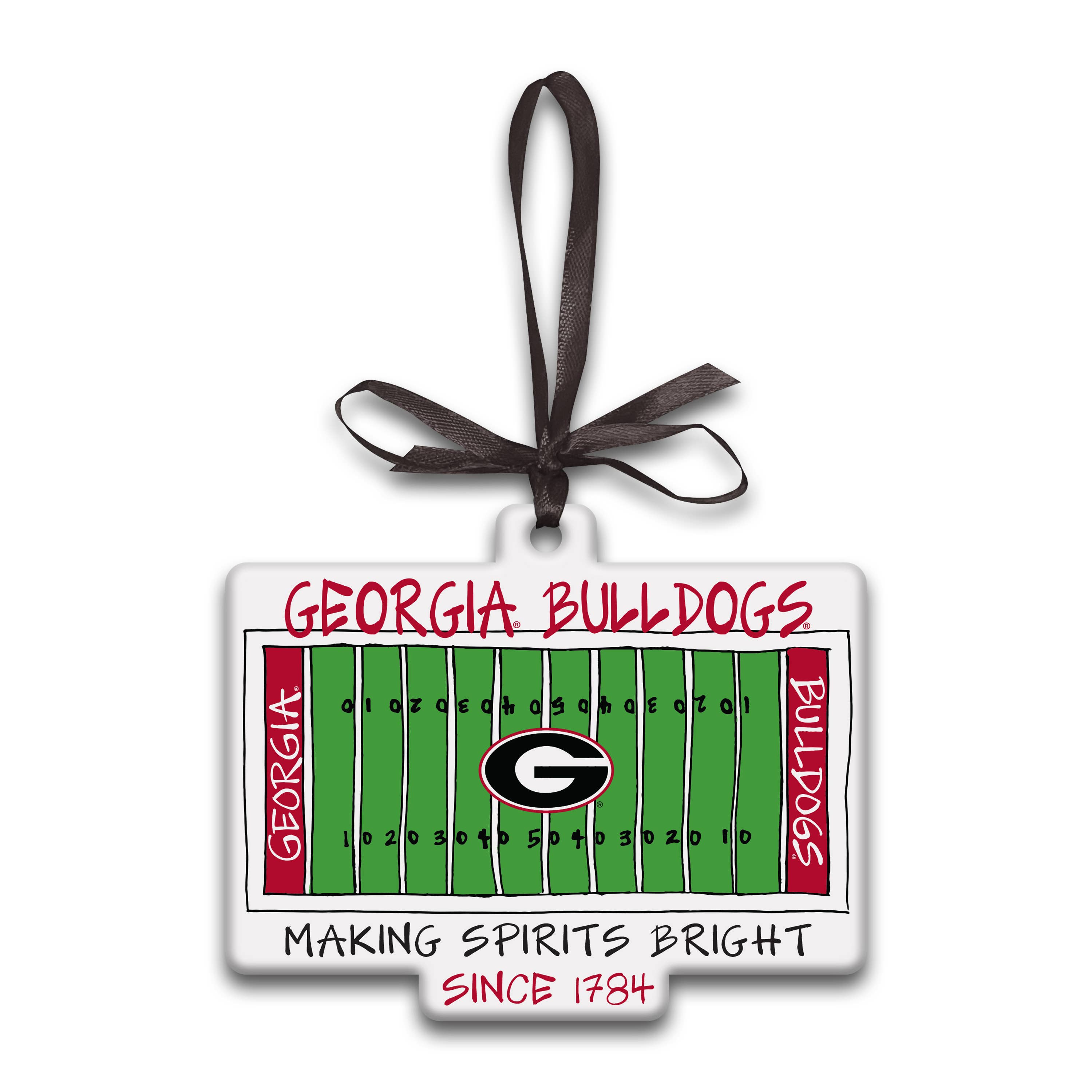 A Georgia Bulldogs ornament shaped like a football field, with a dark brown ribbon loop at the top. The design features a green field, white yard lines, red side banners reading 'GEORGIA' and 'BULLDOGS', a large 'G' logo in the center, and text reading 'GEORGIA BULLDOGS' and 'MAKING SPIRITS BRIGHT SINCE 1784'.
