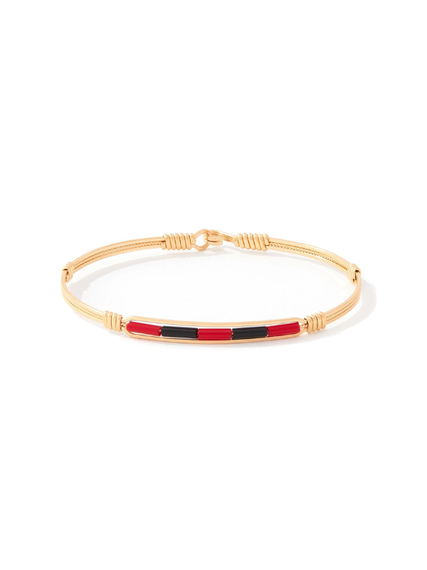 Gold wire bracelet with red and black center beads by Ronaldo, a timeless piece that can be worn for years to come