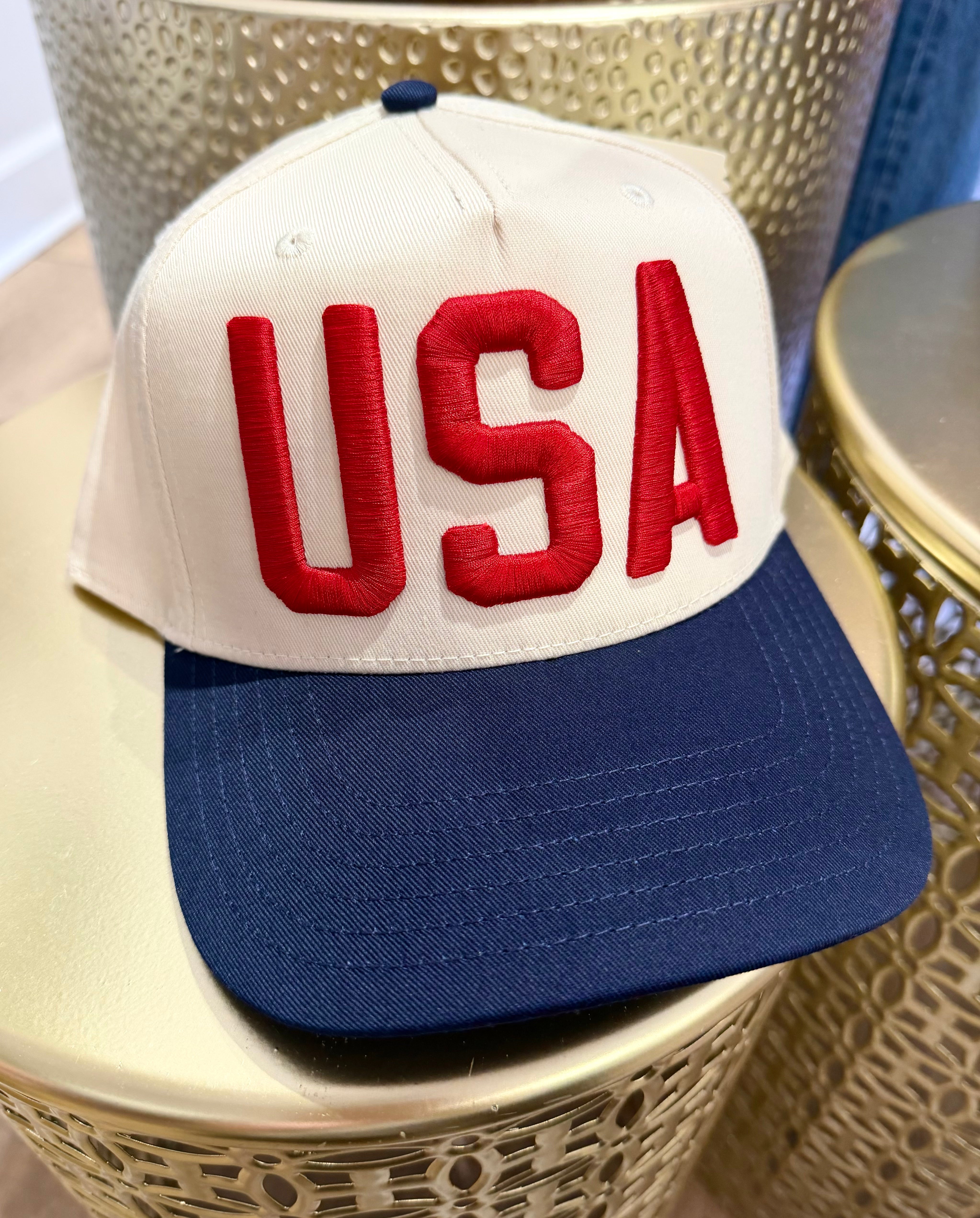 Cap with 'USA' on a textured surface