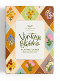 Vintage Blooms playing cards by 1canoe2 featuring colorful hand-painted floral designs on packaging and cards.