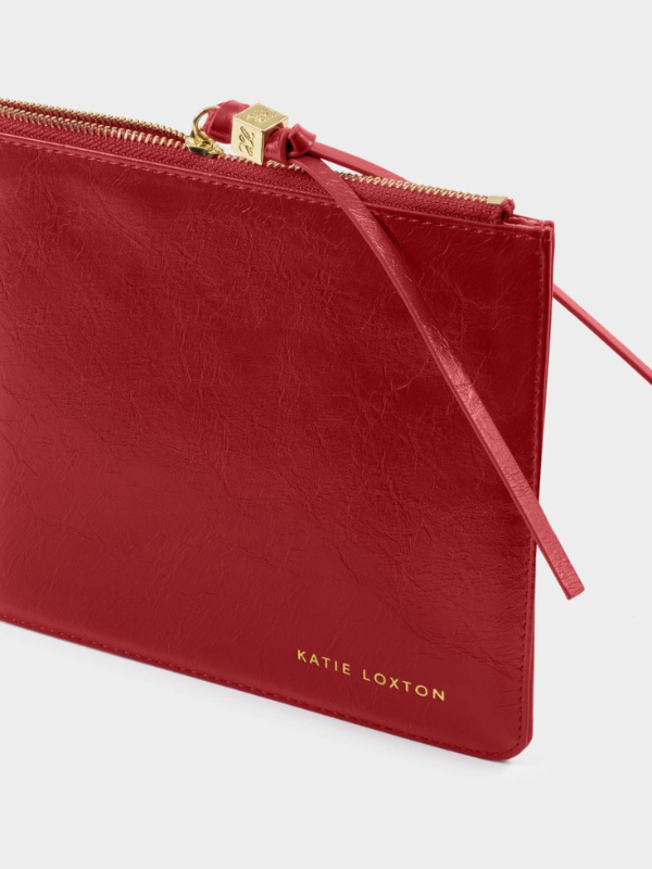 Red Tassel Charm Patent Crackle Pouch By Katie Loxton