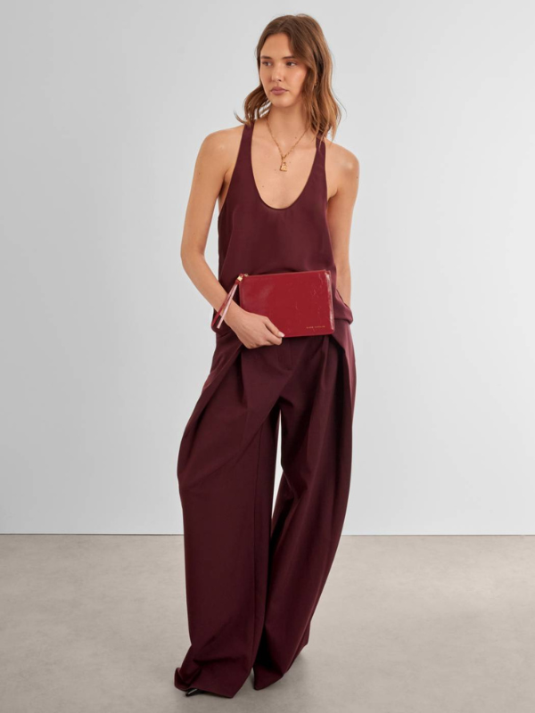 Red Tassel Charm Patent Crackle Pouch By Katie Loxton