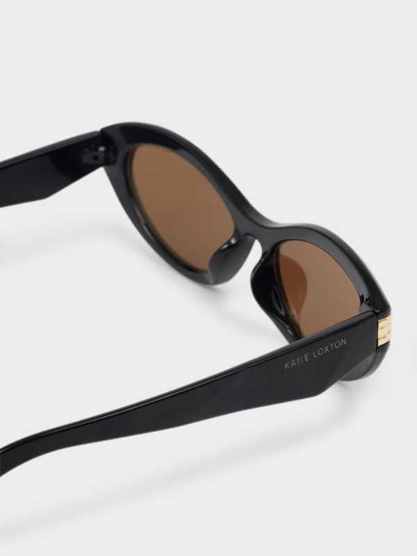 Black Bordeaux Slim Oval Sunglasses By Katie Loxton