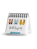Small spiral-bound desk perpetual calendar with colorful shoe illustrations and 'Walk by faith' on the front