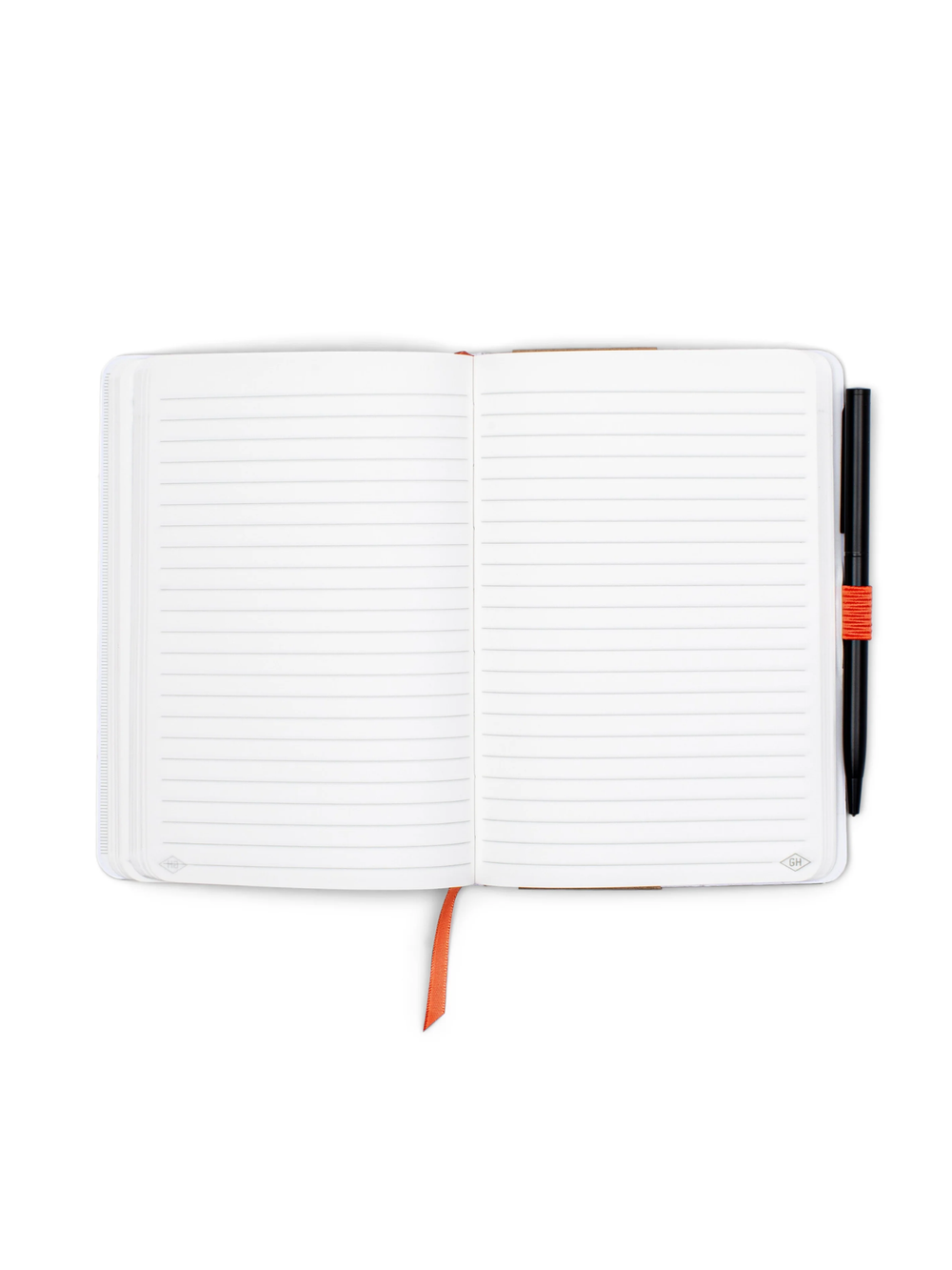 White notebook with a pen 