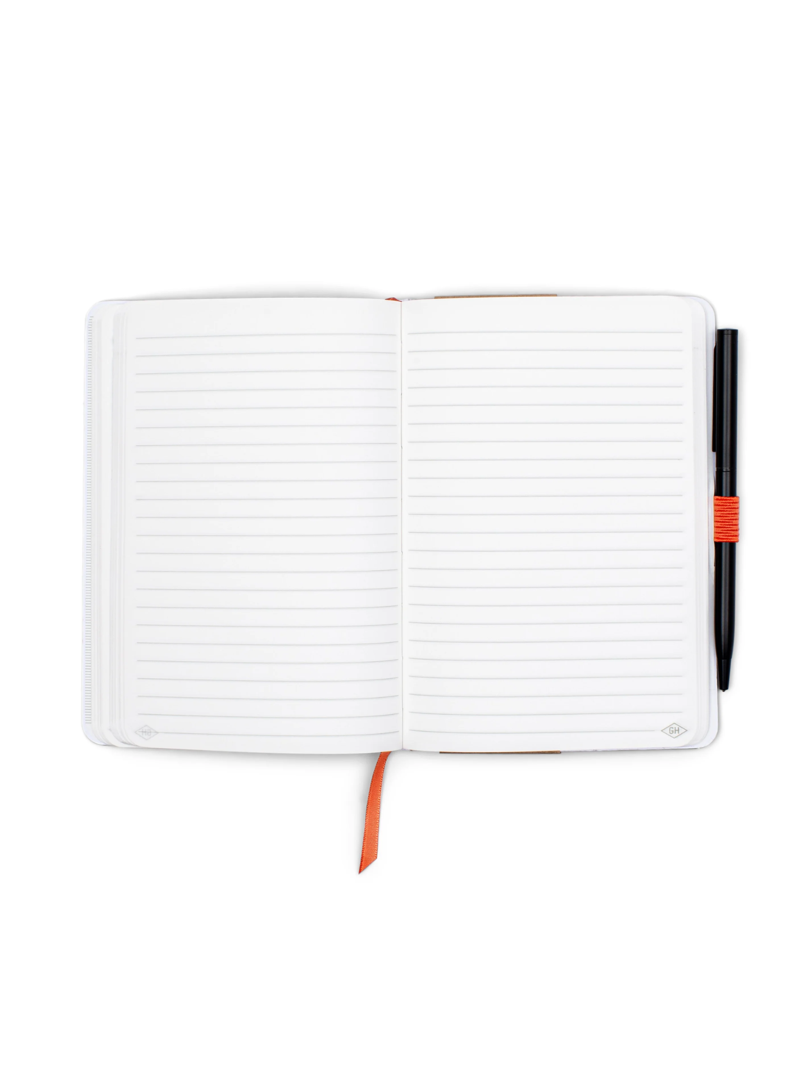 White notebook with a pen 