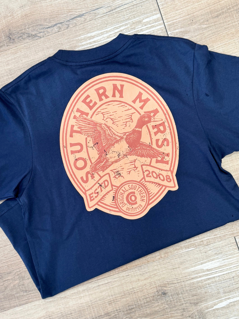 Winged Lager Tee in Navy duck flying