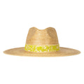 Straw hat with a lime green band featuring designs on a cream background
