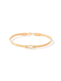 Gold bracelet on a white background