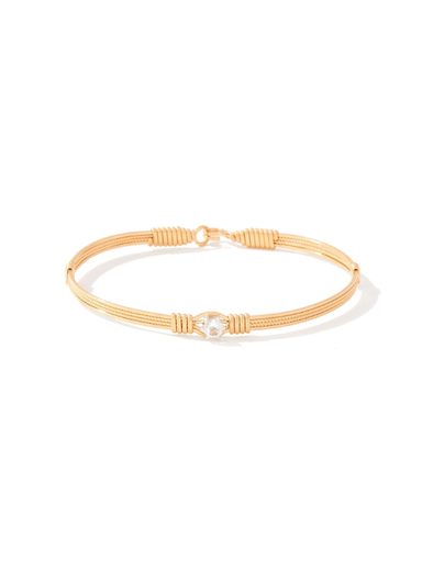 Gold bracelet on a white background
