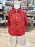 This boys performance polo features a bold red background with an allover black bulldog print, making it an easy pick for Georgia fans.