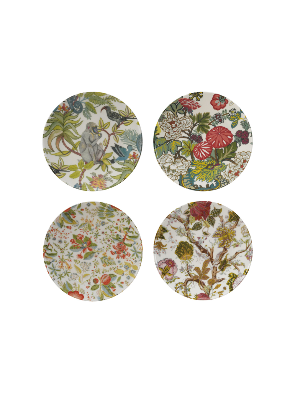 Four round ceramic plates with floral and nature-themed designs