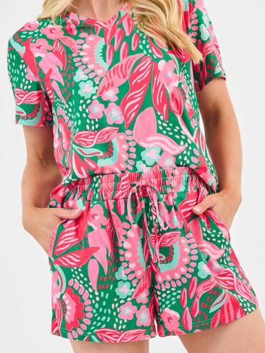 Person wearing a colorful floral pj set