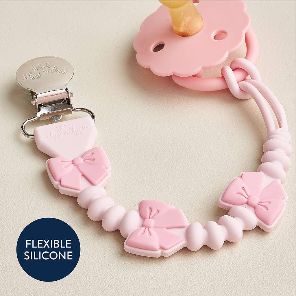 Itzy Paci Strap Plus™: Pink Bows