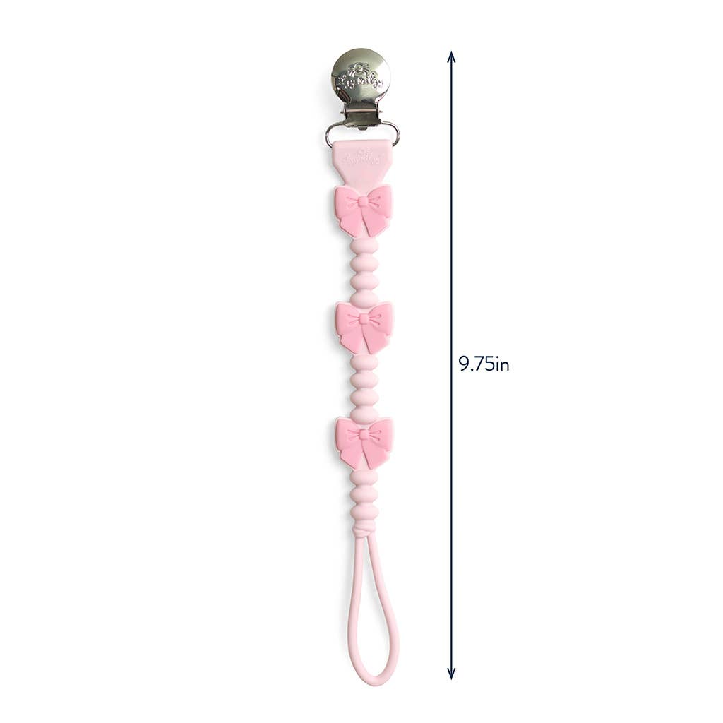 Itzy Paci Strap Plus™: Pink Bows