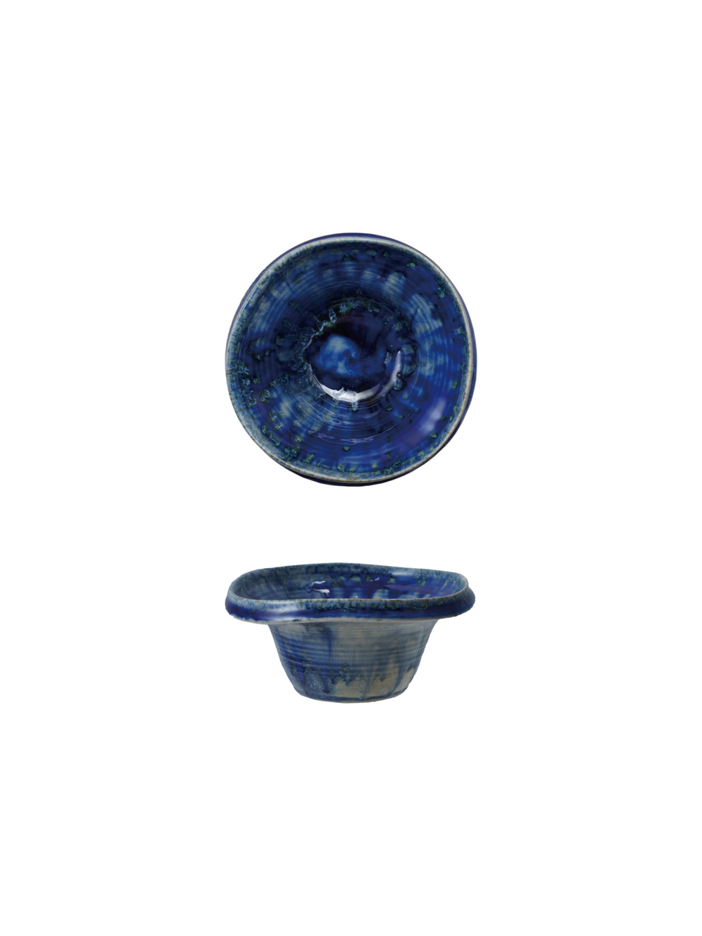 Handcrafted blue stoneware bowl with reactive glaze finish in rich cobalt and navy tones, featuring an organic shape and artisanal texture.