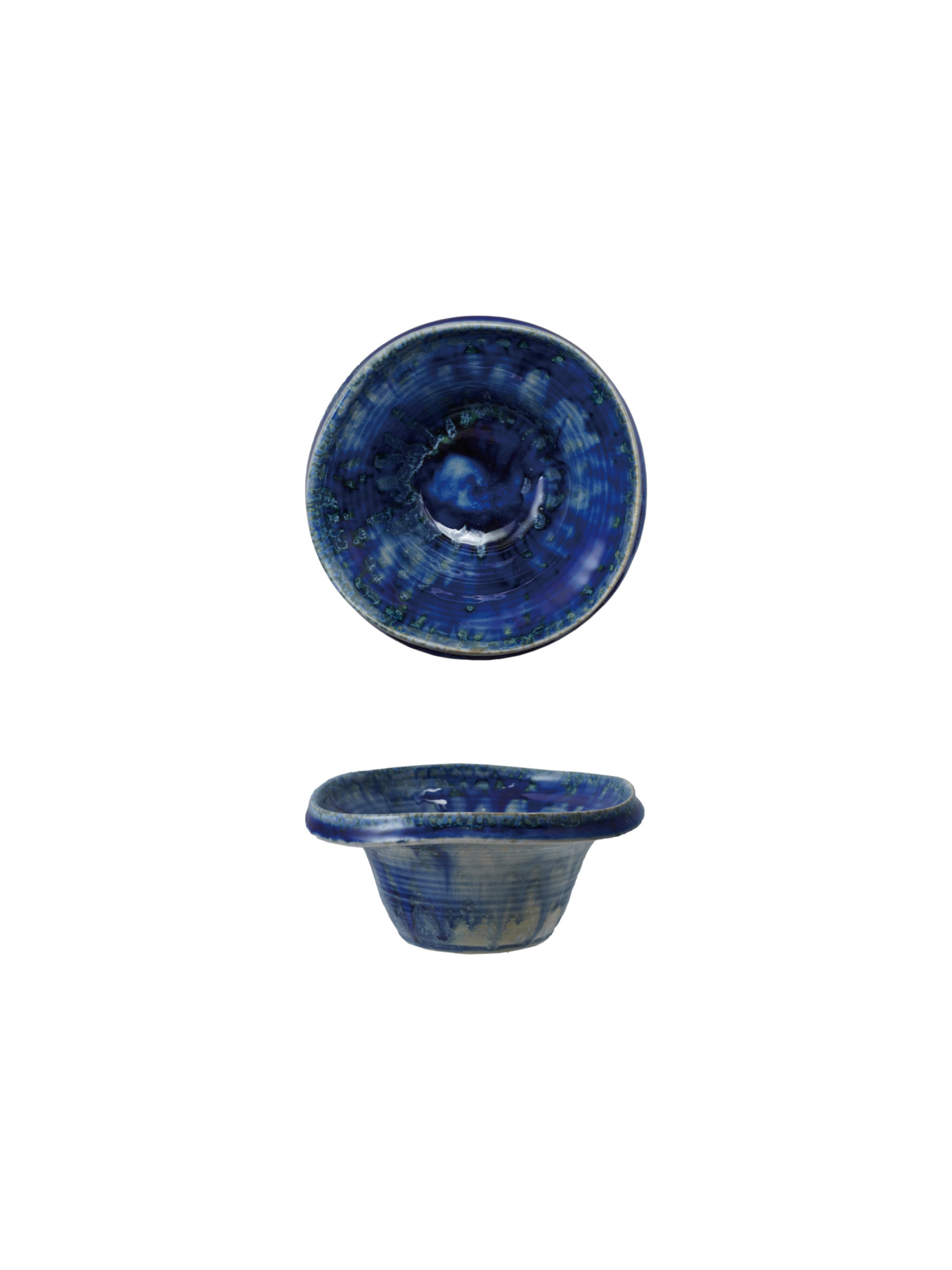 Handcrafted blue stoneware bowl with reactive glaze finish in rich cobalt and navy tones, featuring an organic shape and artisanal texture.