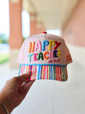 colorful hat with happy teacher on the front 