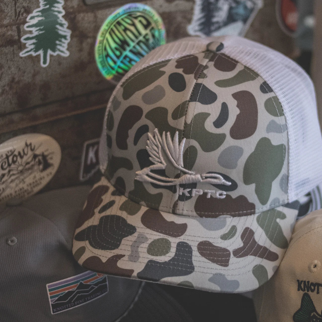 Mallard Logo Trucker Hat in Snow Camo by Knotted Pine Trading Co.