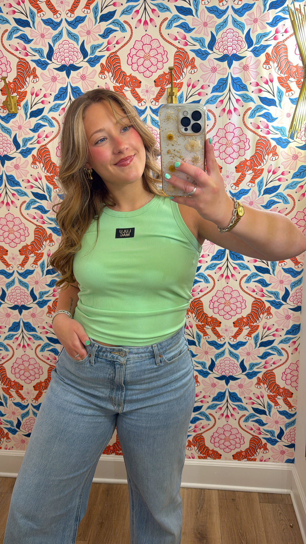 mint green tank with branded patch