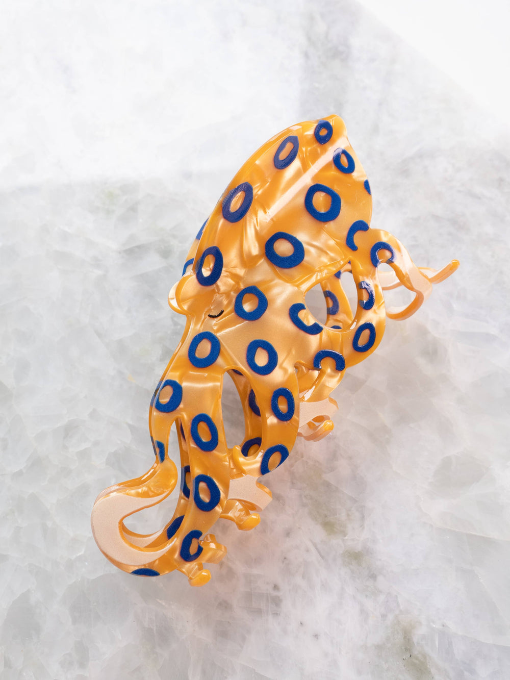 Decorative orange and blue octopus-hair clip