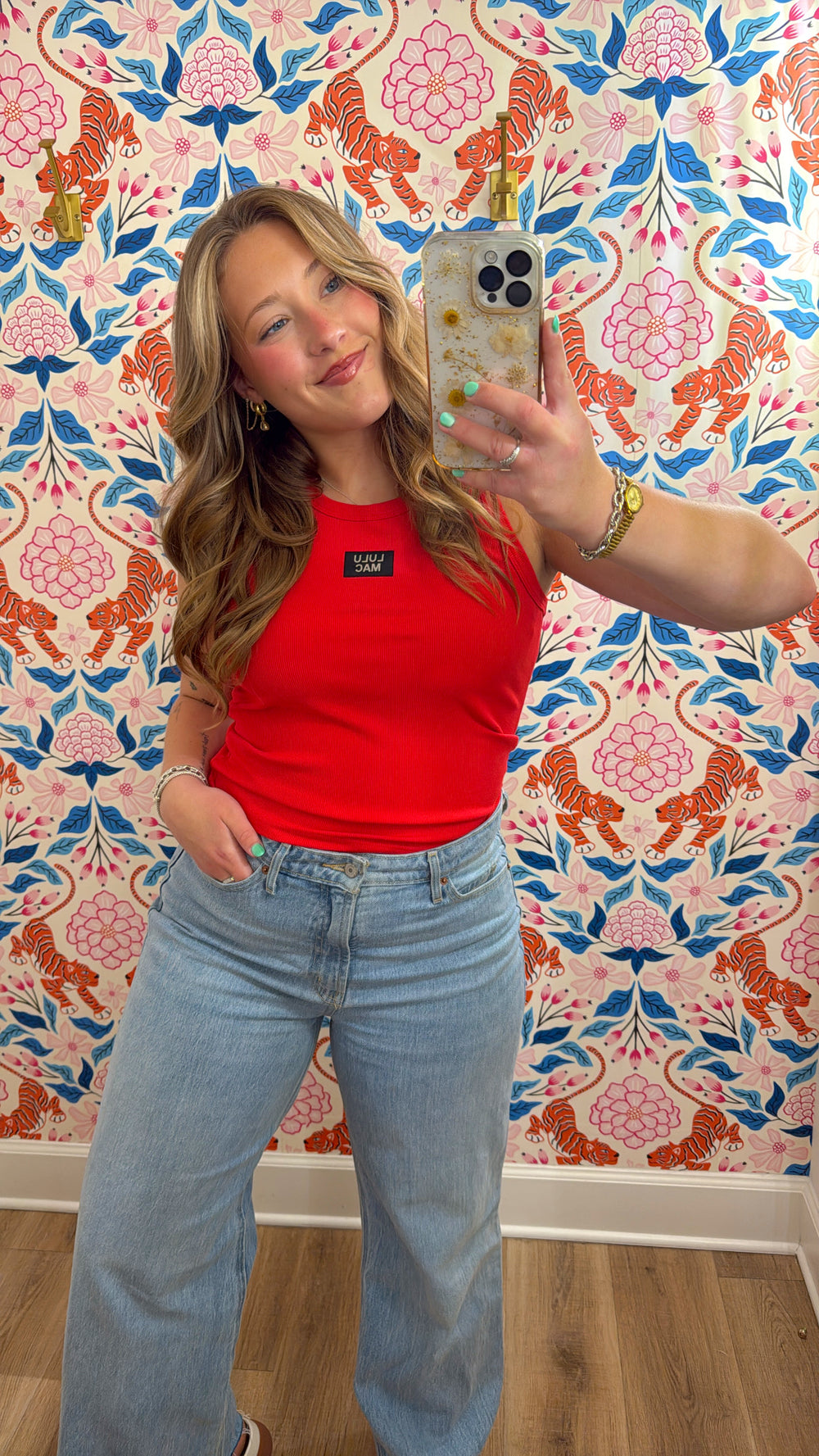 red tank with branded patch