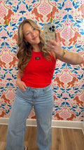 red tank with branded patch