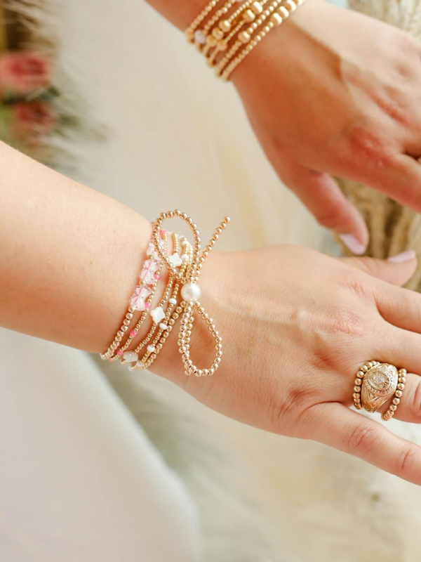 Extended Gold Bow Beaded Bracelet