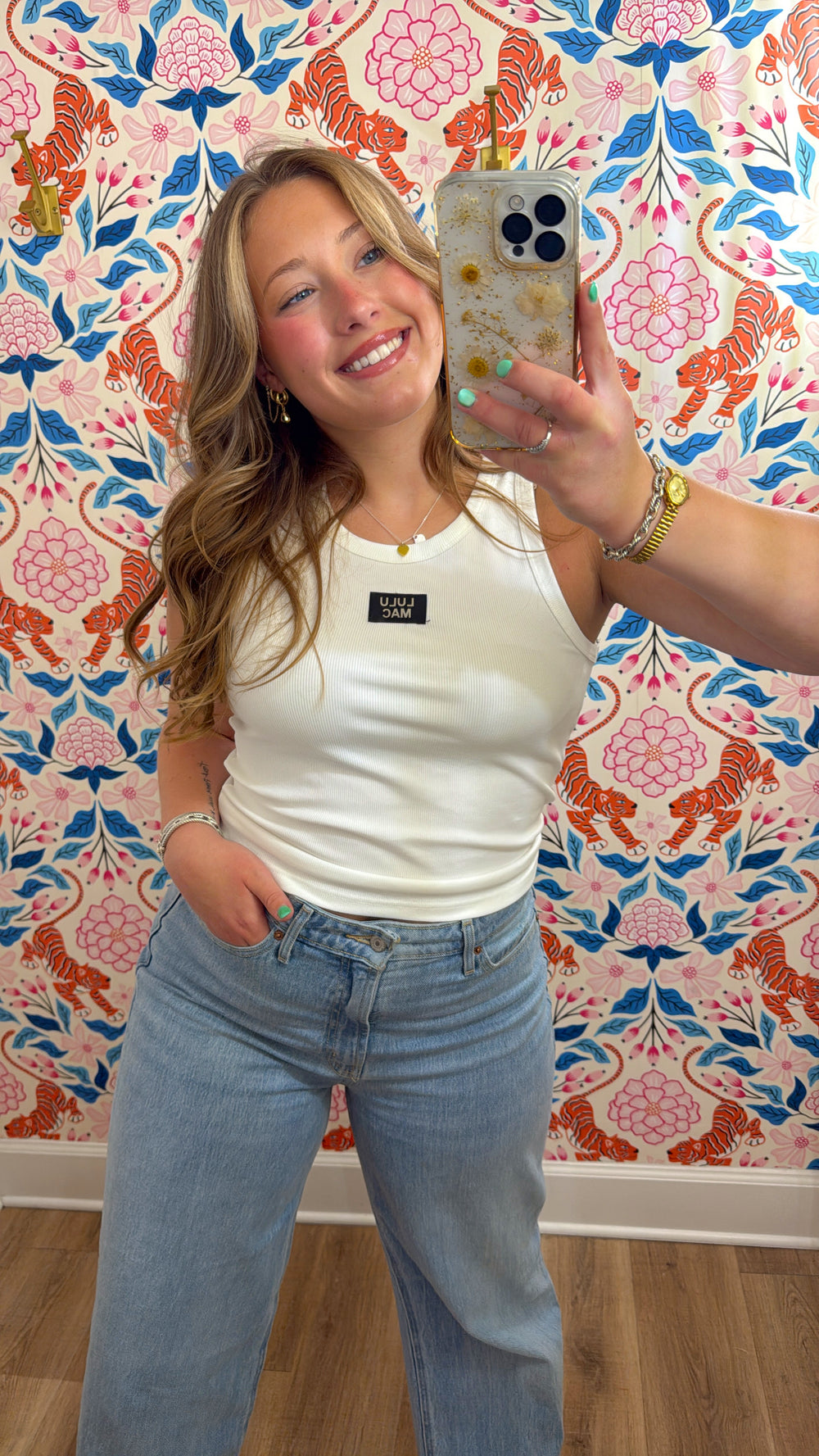 white tank with branded patch