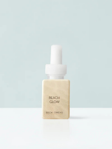 Pura scents with notes of warm sand, fresh ozone bergamot, ivy, tuberose absolute, coconut, freesia, peach, benzoin, vanilla, and musk